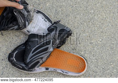 Unrepairable, Broken Old Black Shoes On Background With Copy Space.