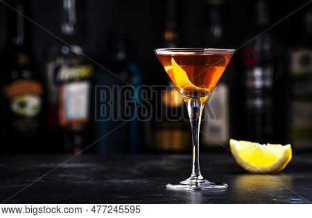 Bobby Burns Alcoholic Cocktail Drink With Scotch Whiskey, Vermouth And Liquor In Martini Glass, Dark