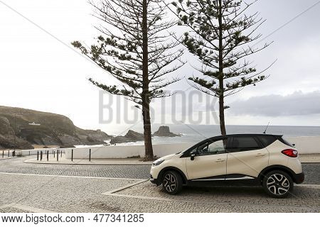 Zambujeira Do Mar, Portugal- October 20, 2022: White Car Parked By The Shore In Zambujeira Do Mar Be