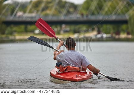 Kayaking On A River In Summer, Outdoor Environment