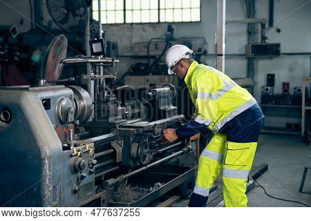Factory Worker Or Engineer Do Machine Job In Adept Manufacturing Workshop . Industrial People And Ma
