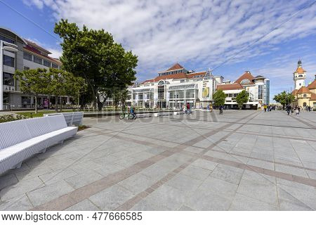 Sopot, Poland - June 2, 2023: Sopot's Friends Square With Spa House And Sopot Lighthouse At The Balt
