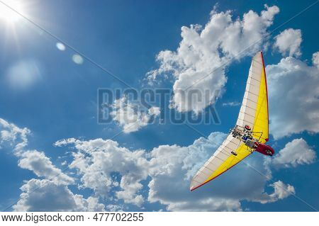 Motoplane With A Cradle Or Motoplane In A Clear Blue Sky