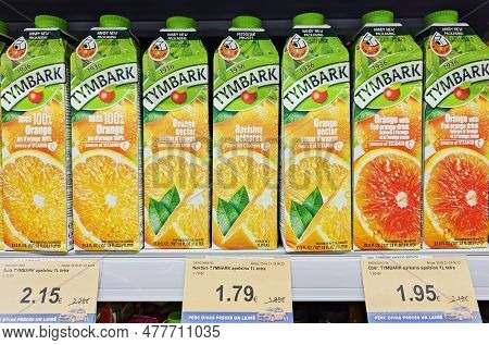 Latvia, Riga, 12, May, 2023: Tymbark Juices Tetra Pack Packages Show On A Shelf For Sale In A Mego S