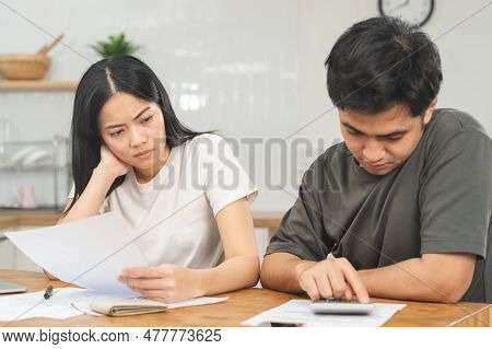 Stressed, Hand Of Asian Young Couple Love Family, Confused By Calculate Expense From Invoice Or Bill