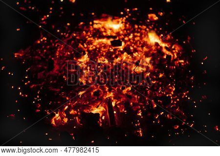 Blurred Background Of Burning Coals In A Barbecue Brazier, Close-up