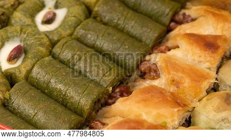 Turkish Pistachio Baklava Isolated On A White Background. A Variety Of Turkish Sweet Baklava. Walnut