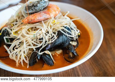 Delicious Jjamppong, Jjambbong, Chinese-style Korean Noodle Soup Topped With Spicy Seafood And Kimch