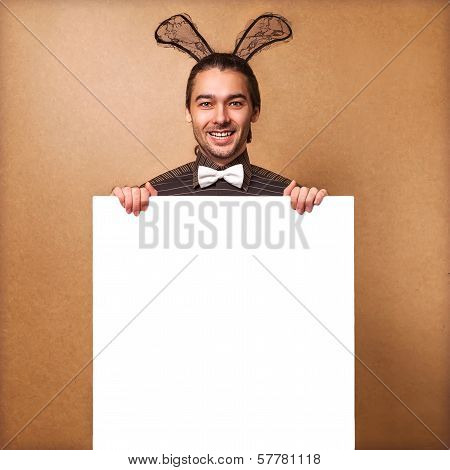 Fashion Guy In  Bunny With Rabbit Ears Holding White Board. Sale, Prices Fall