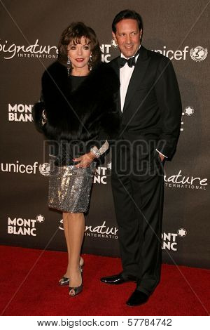 Joan Collins and Percy Gibson at the Montblanc 'Signature for Good' Charity Gala. Paramount Studios, Los Angeles, CA. 02-20-09