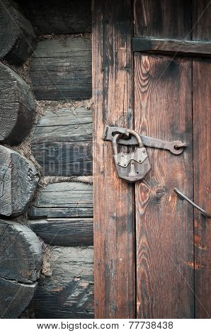 Old Wooden Door With Metallic Doorlock