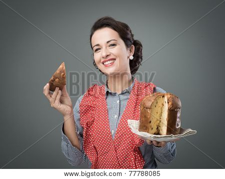 Woman In Apron Eating Panettone