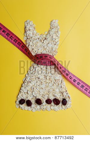 Dress Shape Made From Oatmeal With Measuring Tape