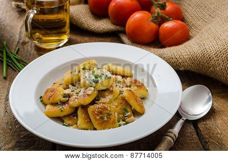 Homemade Potato Gnocchi With Nuts And Parmesan