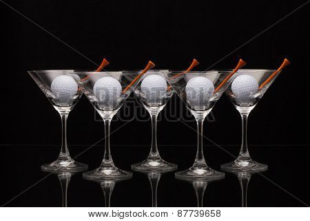 Five Glasses Of Champagne And Golf Balls