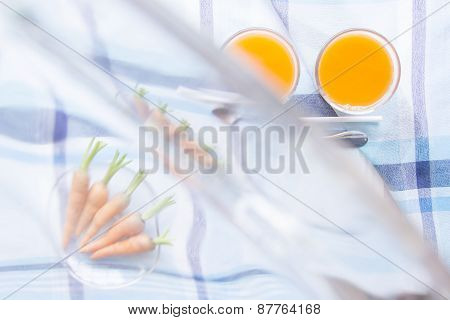 Blurring Transparent Carot Juice And Raw Material