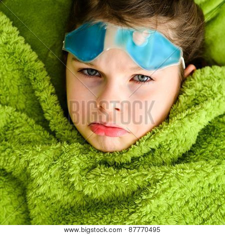 Sick Child Girl Under A Blanket
