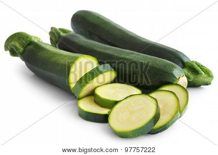Whole green courgettes.