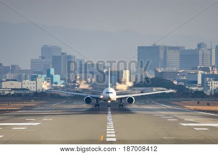 Airplane taking off from the Itami International Airport in Osaka, Japan.