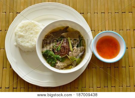 boiled pork blood and entrails soup eat couple with rice on dish