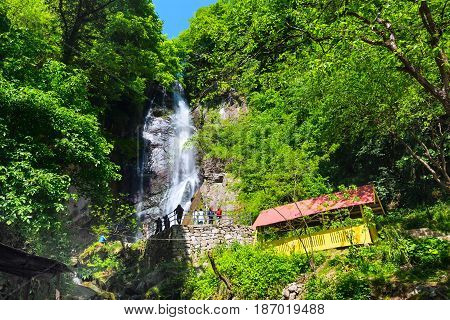 Batumi, Georgia - May 1, 2017: People near georgian Adjara nature gem Makhuntseti waterfall