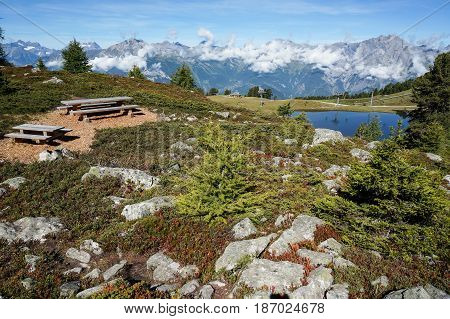 Nice view along trekking trial with the Alps in background in Nendaz, Switzerland.