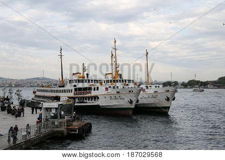 ISTANBUL TURKEY - MAY 07 2017: Sehir Hatlari ferries in Karakoy Port. Sehir Hatlari was established in 1844 and now carry 150000 passengers a day.