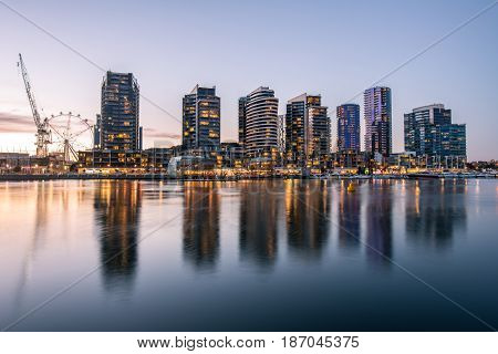 The reflection of Docklands waterfront area in Melbourne at night, Australia.
