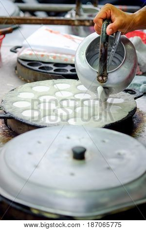 Sweet and Savory Grilled Coconut-Rice Hotcakes it`s for kanom krok but sometiems they use Coconut Rice CakeThai COconut pudding too