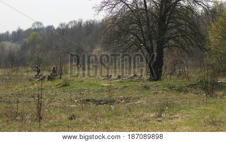 Military soldiers at tactical exercises with guns