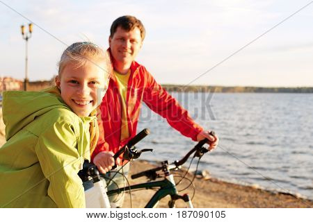 Biker family. Happy family on bikes. Clouseup