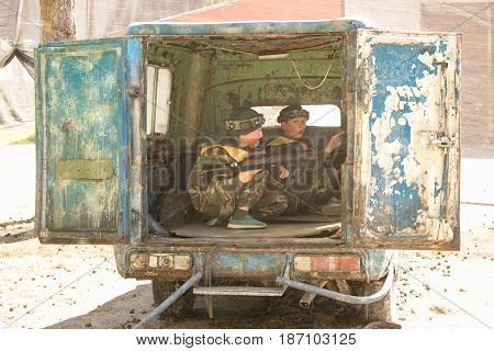 GOMEL BELARUS - May 15 2017: Children and adults play the collective game LASERTAG in the open air