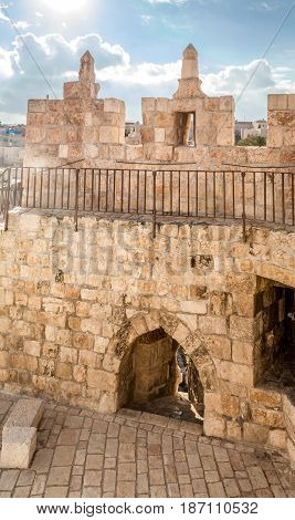 The Damascus gate or Shechem Gate crenellated parapet of the Damascus gate inside the tower above the gate in Old City of Jerusalem Israel