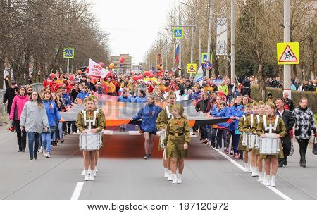 Kirishi, Russia - 9 May, People on the action immortal regiment, 9 May, 2017.
Preparation and conduct of the action Immortal regiment in small cities of Russia.