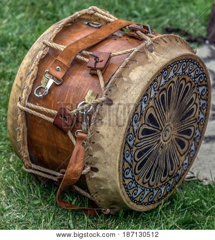 Ancient Dacian wooden and leather drum with decorations used in battles.
