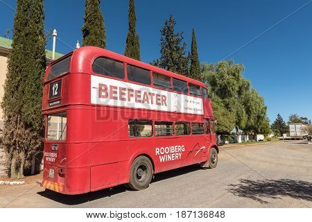 MATJIESFONTEIN SOUTH AFRICA - APRIL 2 2017: Historic double-decker bus at the Victorian village a national monument. Town built as refreshment stop on the Johannesburg to Cape Town railway