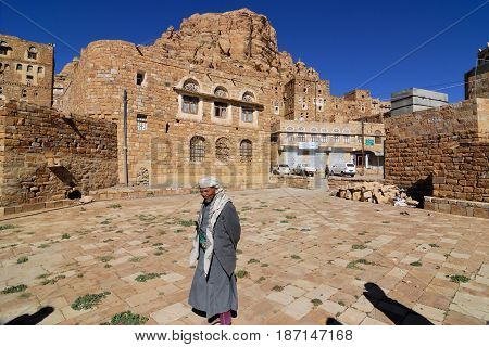 Thula Yemen - MAR 14 2010: People on the street in medieval of Thula. Thula is a UNESCO World Heritage City now destroyed by the civil war