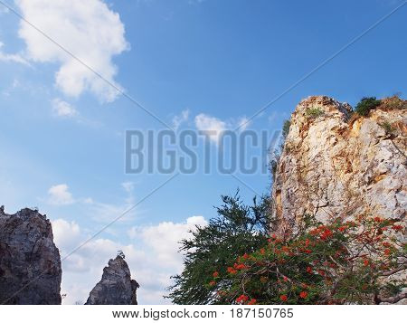 High mountain against blue sky at Khao Ngoo Rock Park or Thueak Khao Ngu Ratchaburi Province Thailand.