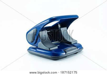 Hole puncher isolated on white background. Office accesories. Hole puncher side view.