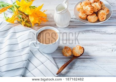 Coffee And Eclairs On A White Background