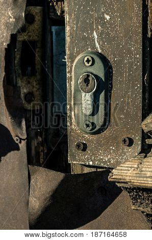 Old door keyhole. Door lock of vintage house.