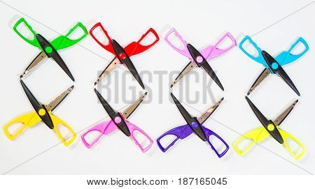 Colorful Scissors in different arrangements and shapes