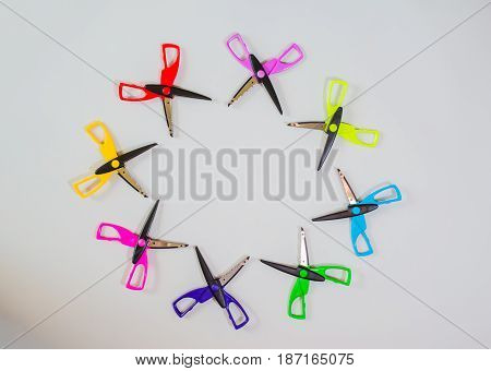 Colorful Scissors in different arrangements and shapes