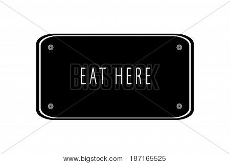 Eat Here written on a blackboard on a white background to connote an advertising concept