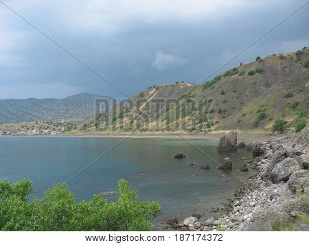 Coastal cliffs coastline rocky shore the view from the sea side Crimea peninsula Ukraine Black Sea Coast
