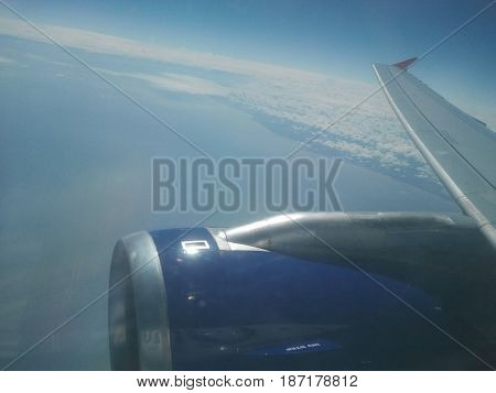 Beautiful Skyline from Plane Window on Hot Sunny Day