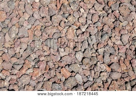 Pebbles of a reddish shade for paths