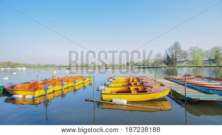 boat park on beautiful lake river in park nice weather nature and blue sky / boat at lake