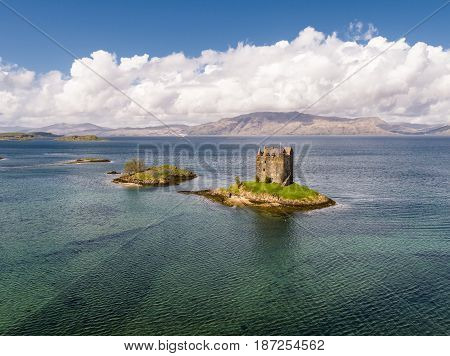 Aerial of the historic castle Stalker in Argyll, Scotland