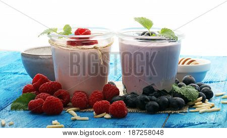 Beautiful Appetizer Pink Raspberries Fruit Smoothie Or Milk Shake In Glass Jar With Berries Backgrou